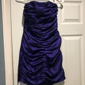 Dark purple Jessica McClintock mini dress.